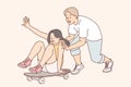 Young couple fun in skate park, enjoying pleasure of relaxing together and riding skateboard