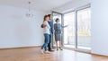 Young couple getting tour through apartment they consider renting Royalty Free Stock Photo