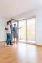 Young couple getting tour through apartment they consider renting Royalty Free Stock Photo