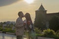 A young couple - a girl and boy sunset summer sky background. Silhouettes and shadows of people. Royalty Free Stock Photo