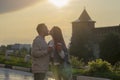 A young couple - a girl and boy sunset summer sky background. Silhouettes and shadows of people. Royalty Free Stock Photo