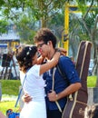 Lima, Peru. Young happy couple hugging in a park