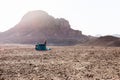 Young couple girls camping desert tent morning mountain waving hello