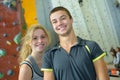 Young couple giving high five in climbing gym Royalty Free Stock Photo