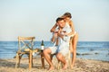 Young couple with glasses of wine having romantic dinner Royalty Free Stock Photo