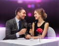 Young couple with glasses of wine at restaurant Royalty Free Stock Photo