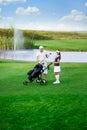 Young couple on golf course Royalty Free Stock Photo