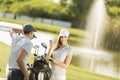 Young couple at golf court Royalty Free Stock Photo