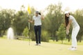 Young couple at golf court Royalty Free Stock Photo