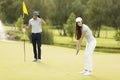Young couple at golf court Royalty Free Stock Photo