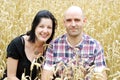 Young couple in a grain field Royalty Free Stock Photo