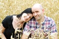 Young couple in a grain field Royalty Free Stock Photo