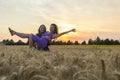 Young couple at grain field Royalty Free Stock Photo