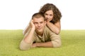 Young couple on green carpet