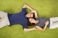 Young couple on green carpet