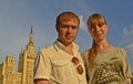 A young couple a guy and a girl walking through the city. Royalty Free Stock Photo