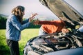 A young couple had a car breakdown on the road Royalty Free Stock Photo