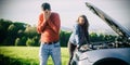 A young couple had a car breakdown on the road Royalty Free Stock Photo