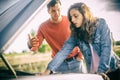 A young couple had a car breakdown on the road Royalty Free Stock Photo