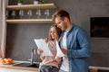 Young couple is happy as they has finished to pay for a loan