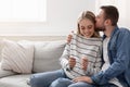 Young couple happy about positive results of pregnancy test Royalty Free Stock Photo