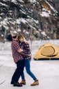 Young couple has fun against background of tent and rocks. Royalty Free Stock Photo