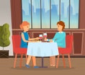 Young couple have a date in restaurant, in love girl and guy communicating, drinking wine, celebrate Royalty Free Stock Photo