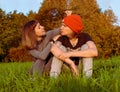 Young couple have fun in the autumn park. Outdoor recreation Royalty Free Stock Photo