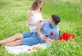 Young couple have picnic with red wine Royalty Free Stock Photo