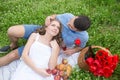 Young couple have picnic with red wine Royalty Free Stock Photo