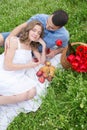 Young couple have picnic with red wine Royalty Free Stock Photo