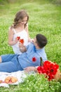 Young couple have picnic with red wine Royalty Free Stock Photo