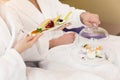 Young couple having breakfast in hotel room Royalty Free Stock Photo