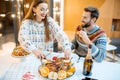 Couple celebrating winter holidays indoors Royalty Free Stock Photo