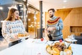 Couple celebrating winter holidays indoors Royalty Free Stock Photo