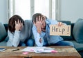 Young Couple having financial problems feeling stressed paying bills debts mortgage asking for help Royalty Free Stock Photo