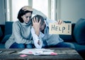 Young Couple having financial problems feeling stressed paying bills debts mortgage asking for help Royalty Free Stock Photo