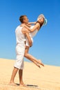 Young couple having fun on the beach Royalty Free Stock Photo