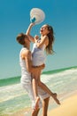 Young couple having fun on the beach Royalty Free Stock Photo