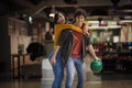 Couple having fun in bowling alley Royalty Free Stock Photo