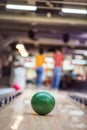 Young couple having fun in bowling alley. Royalty Free Stock Photo