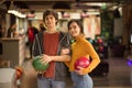 Young couple having fun in bowling alley. Royalty Free Stock Photo