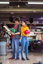 Young couple having fun in bowling alley. Time for competition Royalty Free Stock Photo