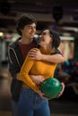 Young couple having fun in bowling alley Royalty Free Stock Photo