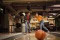 Young couple having fun in bowling alley. Royalty Free Stock Photo