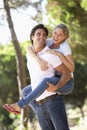 Young Couple Having Fun On Countryside Walk Royalty Free Stock Photo