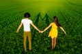 Young couple having fun on the green field in the spring or summer, general plan Royalty Free Stock Photo