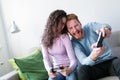 Young couple having fun playing video games Royalty Free Stock Photo