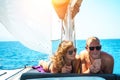 Young couple having fun on a sail boat yacht in the summer holidays vacation. Royalty Free Stock Photo