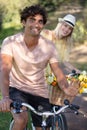 young couple having fun on their bikes